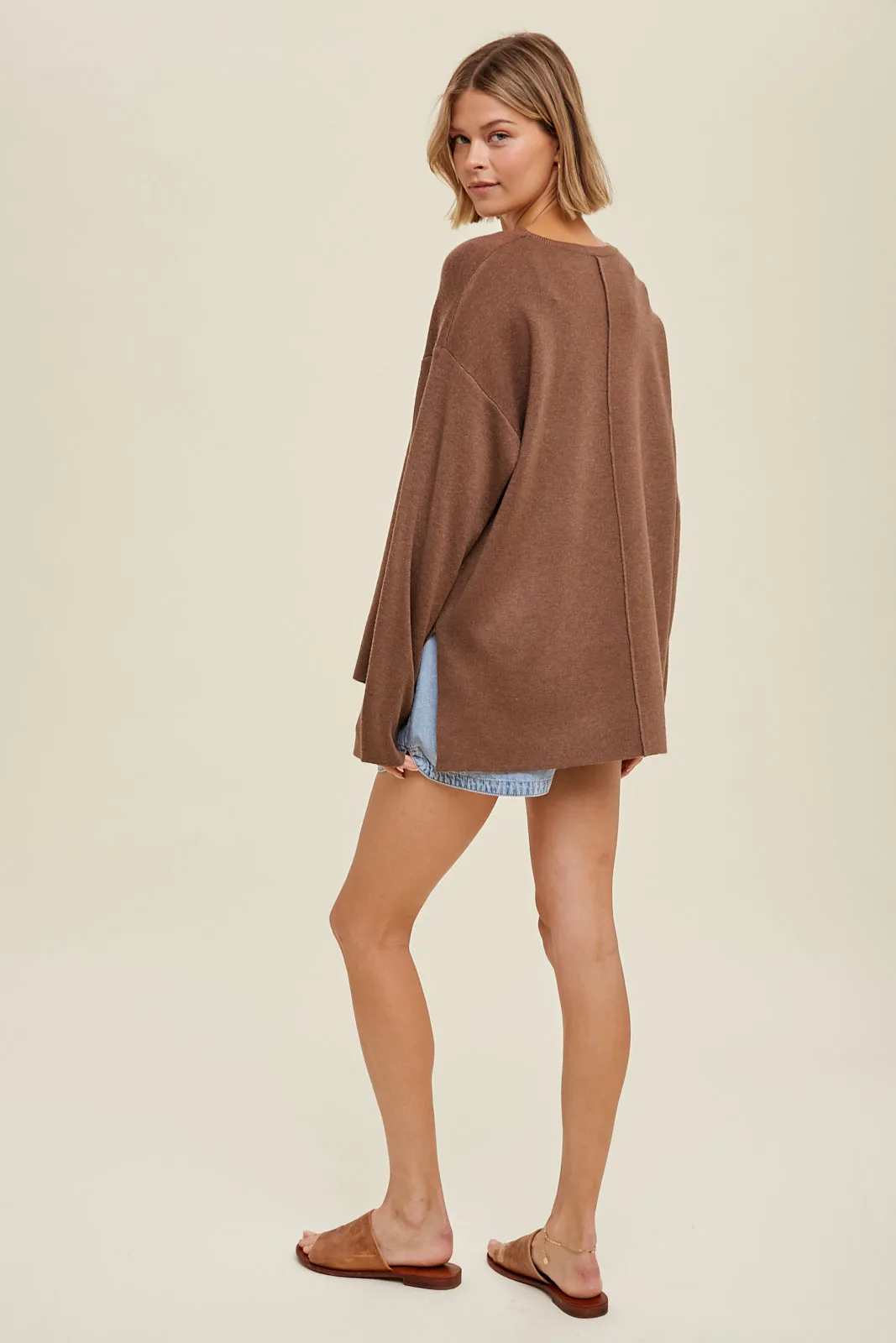 Drop shoulder sweater with side slits